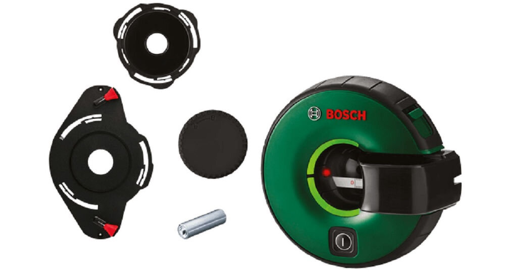 Na obrazie widoczny jest laser liniowy w kolorze zielonym z logo BOSCH oraz kilka akcesoriów, w tym okrągłe elementy i metalowy cylinder. Produkt ma czarny uchwyt i przycisk na obudowie.