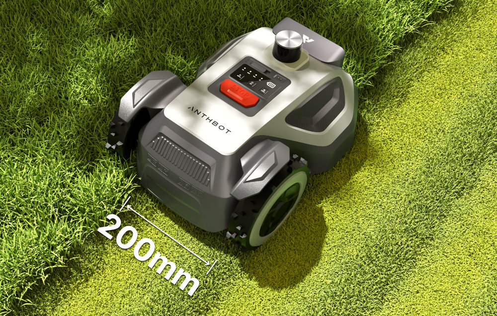 Robot koszący ANTHBOT Genie 1000 na trawie, z widocznym napisem \'ANTHBOT\' i oznaczeniem \'200mm\'.