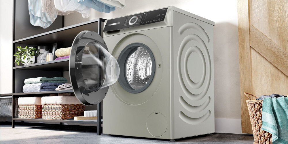 PRALKA BOSCH WGH2460XPL lifestyle kosze na ubrania odzież ręczniki półki regał otwarte drzwiczki bok Wytłoczenia AntiVibration Design budowa konstrukcja stabilność mniej wibracji redukacja drgań spokój komfort