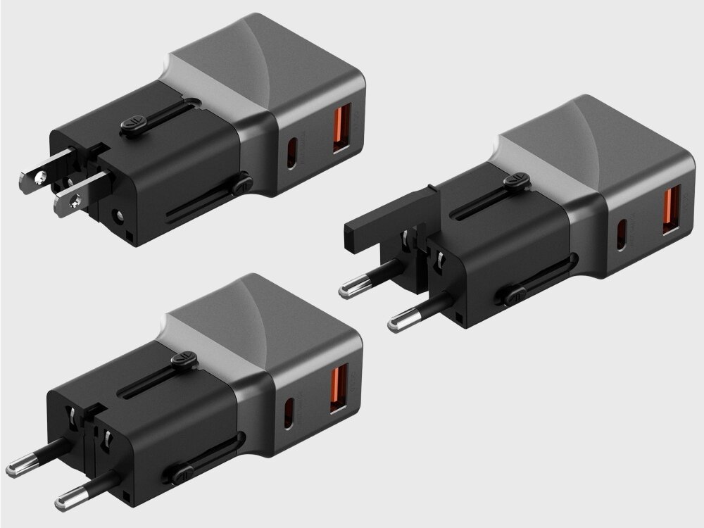 Trzy czarno-brązowe ładowarki sieciowe z widocznymi wtyczkami i portami USB oraz USB-C. Każda ładowarka ma kompaktowy, prostokątny kształt.
