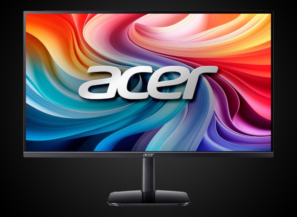 Monitor ACER KA272P0bi Monitor stoi przodem na czarnym tle, a na ekranie widnieje duże napis 'acer' na tle kolorowych falistych linii