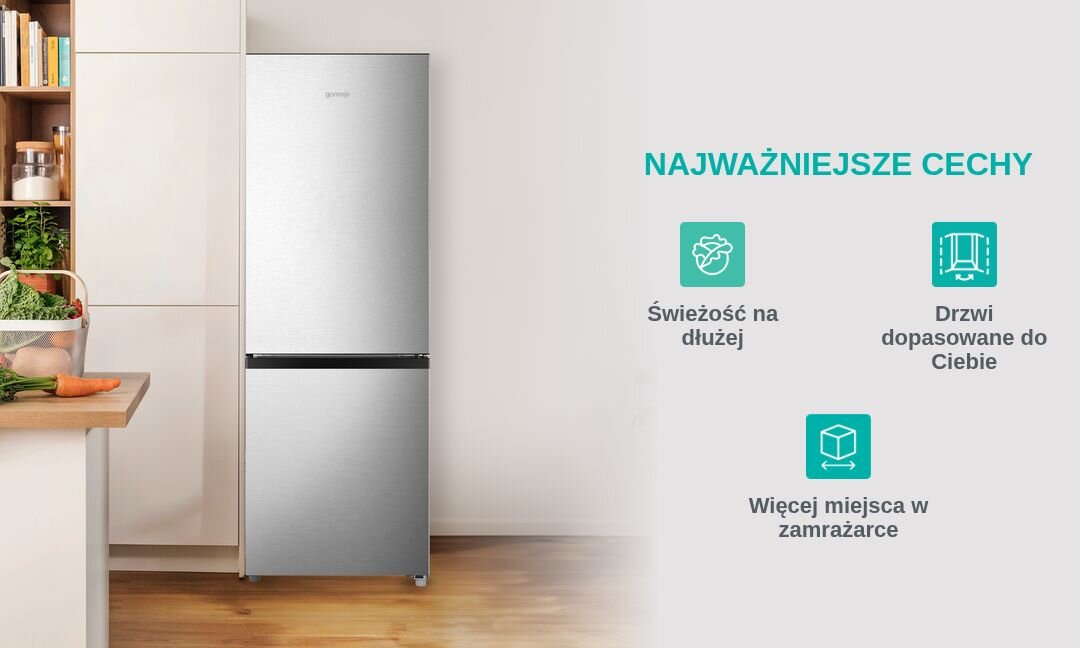 LODÓWKA GORENJE RK14EPS4 Grafika prezentująca wolnostojącą lodówko-zamrażarkę Gorenje w stalowym wykończeniu ustawioną przy zabudowie kuchennej, po prawej stronie wypisano „Najważniejsze cechy”: „Świeżość na dłużej”, „Drzwi dopasowane do Ciebie” oraz „Więcej miejsca w zamrażarce”