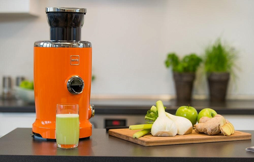Wyciskarka do soku NOVIS Vita Juicer zolty solidne wykonanie wysoka jakosc stylowy design wyglad kompaktowy rozmiar blokada kapania