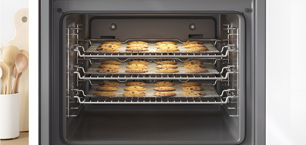 PIEKARNIK BOSCH HBA554EB3 lifestyle wizualizacja wnętrze pieczenie ruszty drabinki ciasteczka 3 poziomy pieczenie na trzech poziomach Termoobieg 3D równomierne rozprowadzanie ciepła jednoczesne pieczenie różnych potraw lasagne muffiny brak mieszania zapachów brak mieszania smaków idealne dopasowanie poziomów większa wydajność