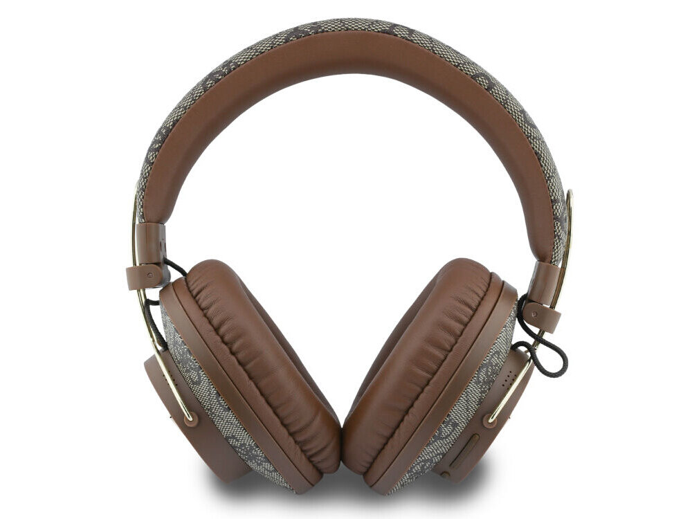 Brązowe słuchawki nauszne z widocznym wzorem na pałąku i nausznikach. Na jednej z muszli znajduje się przycisk oraz port do ładowania.