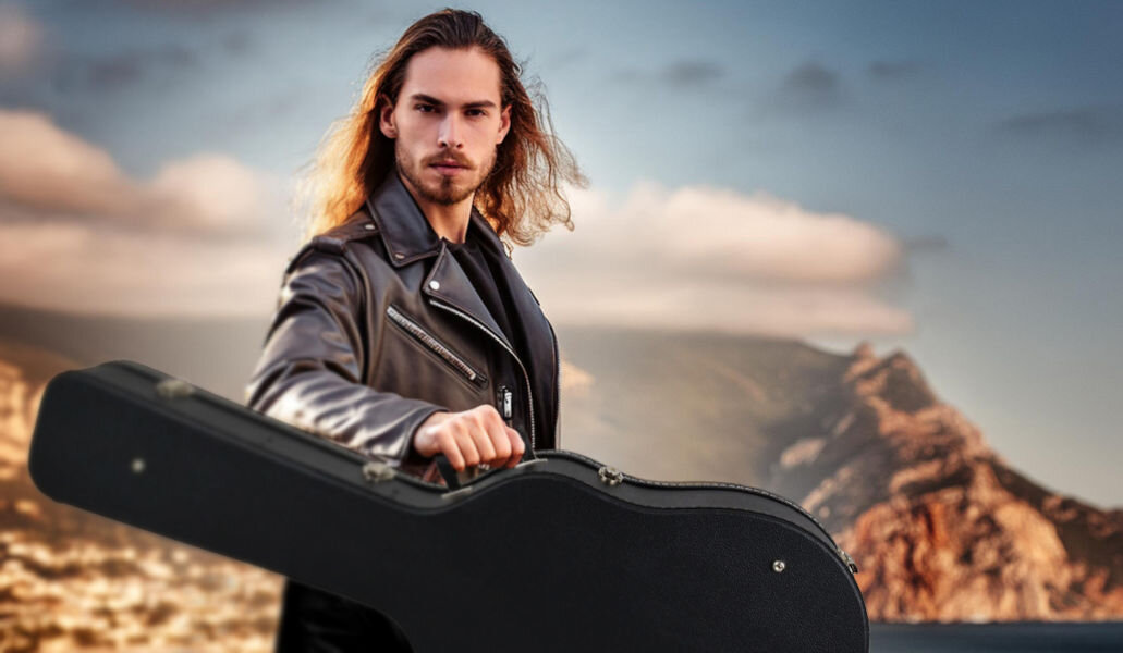 Pokrowiec na gitarę MUSICMATE MM-B95 ochrona gitar akustycznych i klasycznych wymiary 111 x 47 x 16 cm solidna konstrukcja ze sztywnej sklejki obitej czarnym tolexem
					miękka tkanina zamykane zatrzaski ochrona lakieru