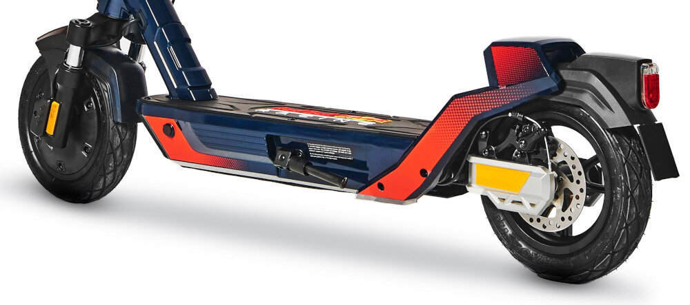 Hulajnoga elektryczna RED BULL RB-RTENTURBO10-12 Granatowo-czerwony podwojny amortyzator z przodu wahacz wleczony z podwojna amortyzacja z tylu kola duze 10-calowe pompowane opony tlumia nierownosci amortyzuja wstrzasy minimalizuja uszkodzenia