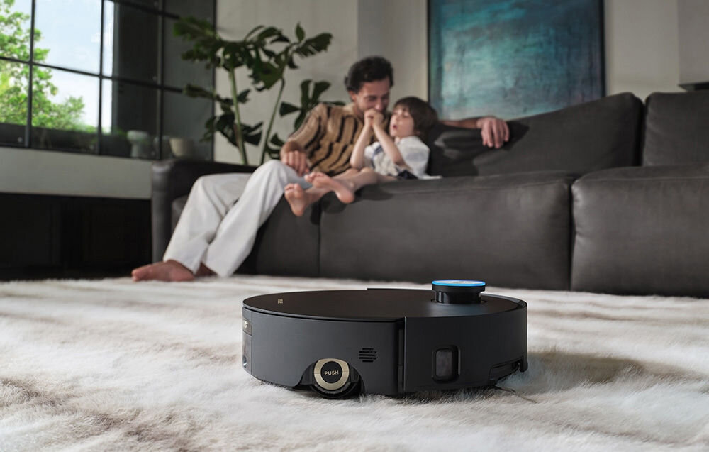 Robot sprzątający DREAME Aqua 10 Ultra Roller Complete Czarny Odpowiedni do dywanów szczotka AutoSeal™ wykrywa miękkie powierzchnie automatycznie osłania rolkę Technologia FluffRoll na fugach i wąskich szczelinach