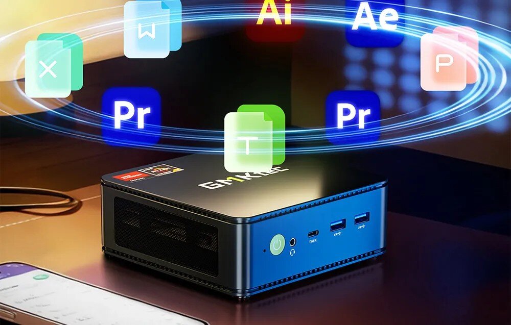 Komputer GMKTEC M5 Ultra Mały ciemny komputer stojący na biurku, nad którym unoszą się kolorowe ikony popularnych programów biurowych i graficznych w niebieskim pierścieniu światła