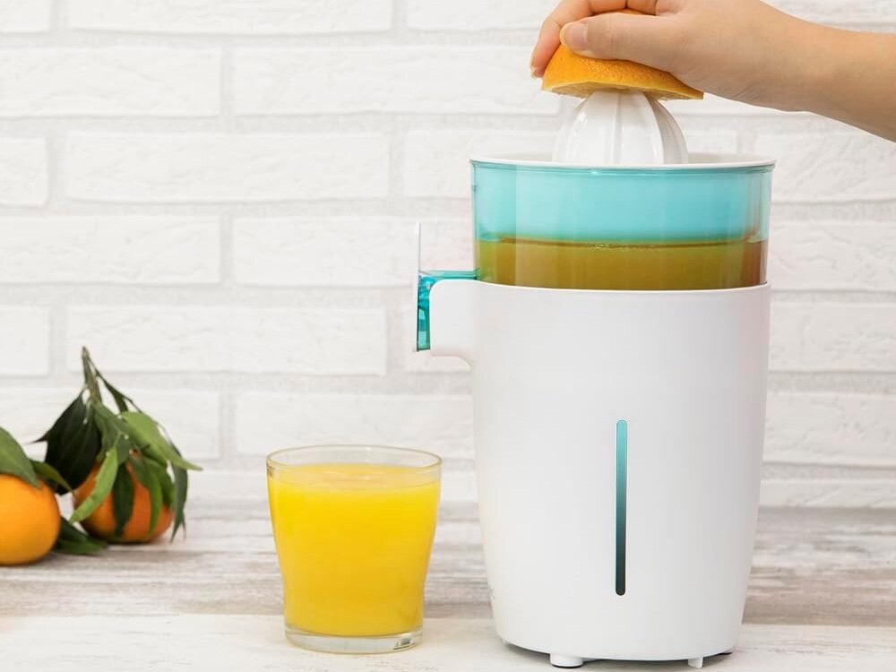 Wyciskarka do cytrusów CECOTEC Zitrus Toweradjust Easy dysza z systemem zapobiegającym kapaniu, antypoślizgowa podkładka, bezpieczne korzystanie