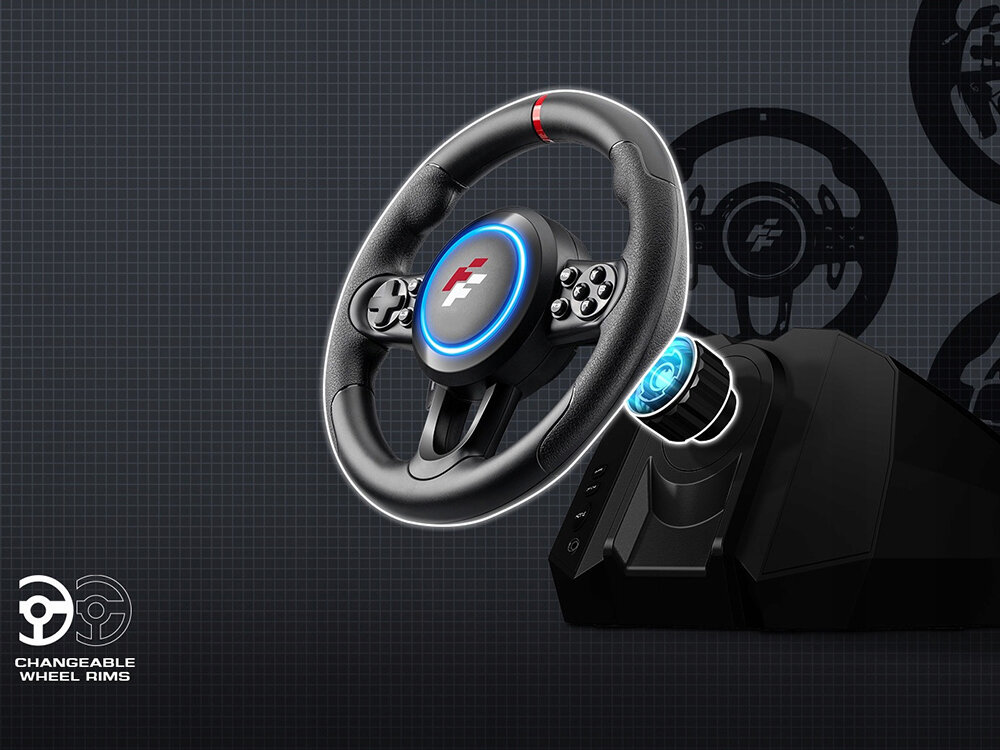 Obraz przedstawia kierownicę do gier z logo \'F\' na środku, otoczoną niebieskim podświetleniem. W lewym dolnym rogu widnieje napis \'CHANGEABLE WHEEL RIMS\'.