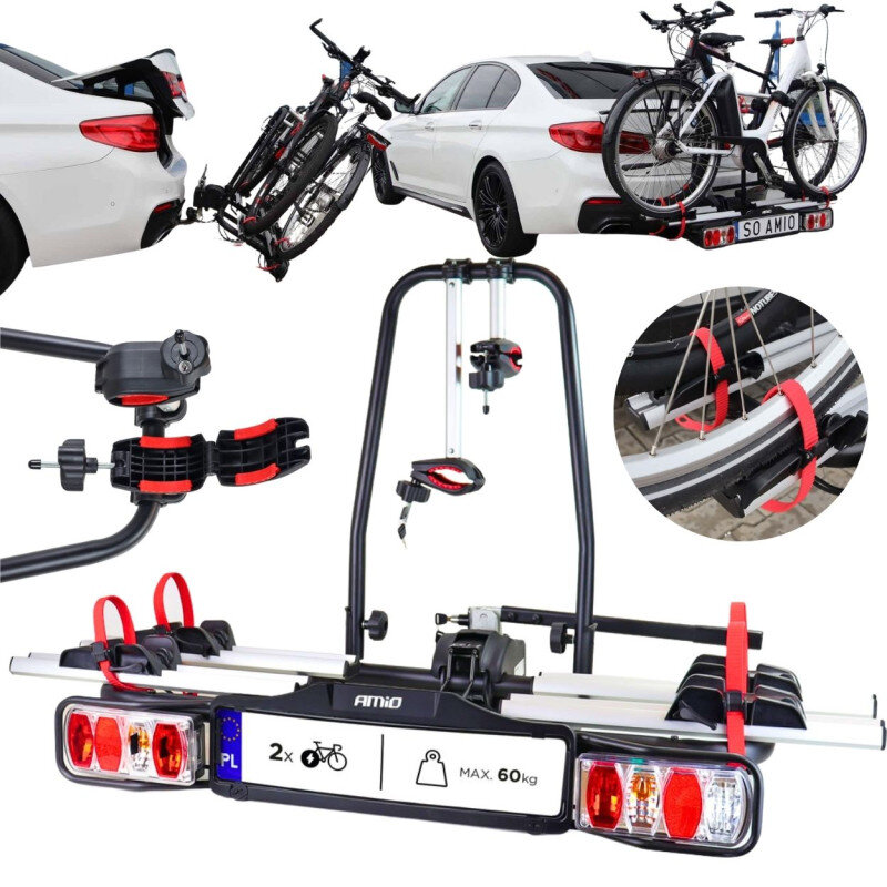 Na obrazie widoczny jest bagażnik rowerowy zamontowany na haku samochodu, z dwoma rowerami. Na bagażniku znajduje się napis \'AMiO\' oraz oznaczenie \'MAX. 60 kg\'.