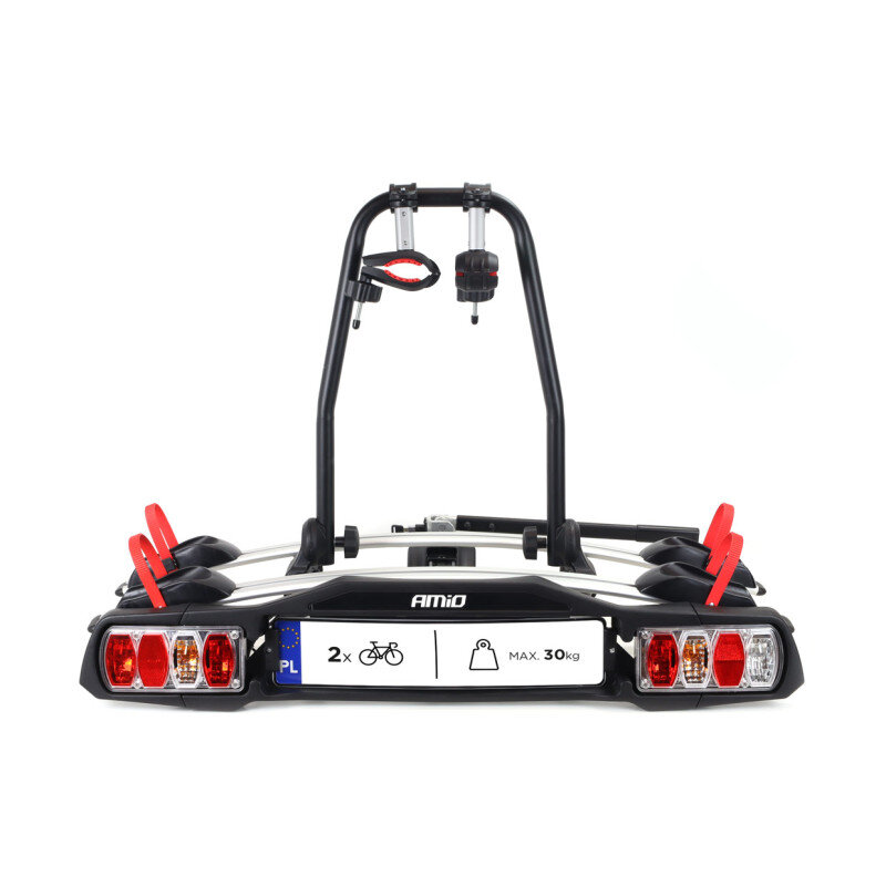 Na obrazie widoczny jest bagażnik rowerowy na hak z logo AMiO, przeznaczony na dwa rowery. Na tabliczce znajduje się tekst: \'2x\', \'MAX. 30Kg\'.