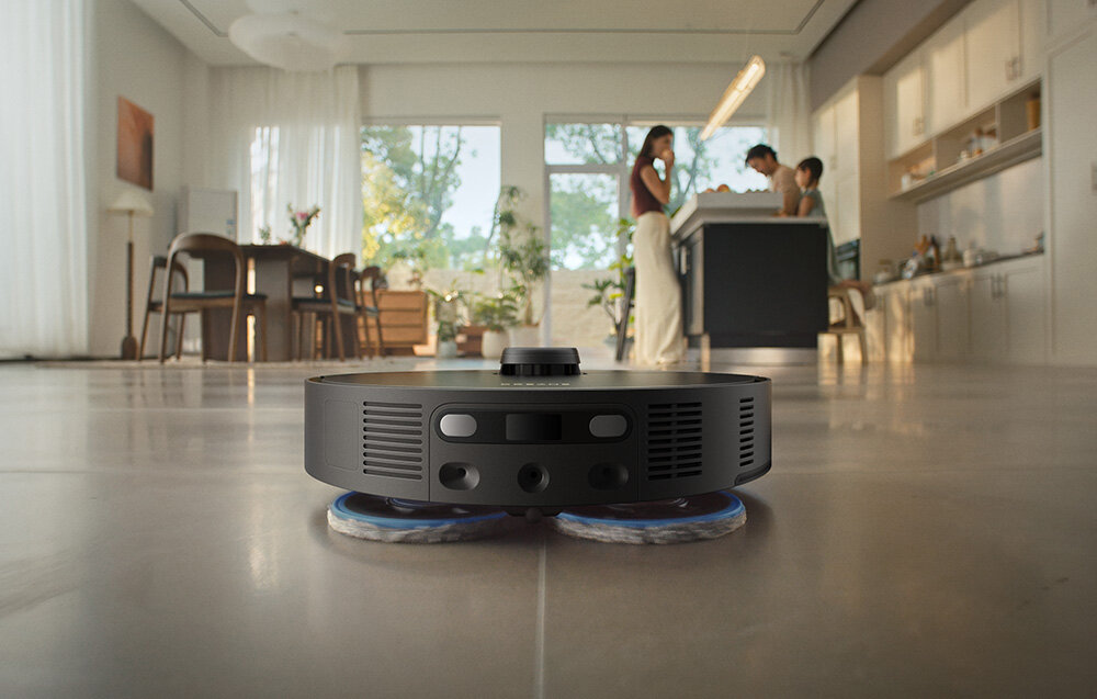Robot sprzątający DREAME Matrix 10 Pro Czarny zdjęcie lifestyle Dokładne mopowanie krawędzi System Dual Omni-Scrub obracające się pady (165 RPM) z naciskiem 8N  Technologia MopExtend™ RoboSwing Funkcja nachylenia padów o 10°  pionowy ruch w zakresie 3 mm