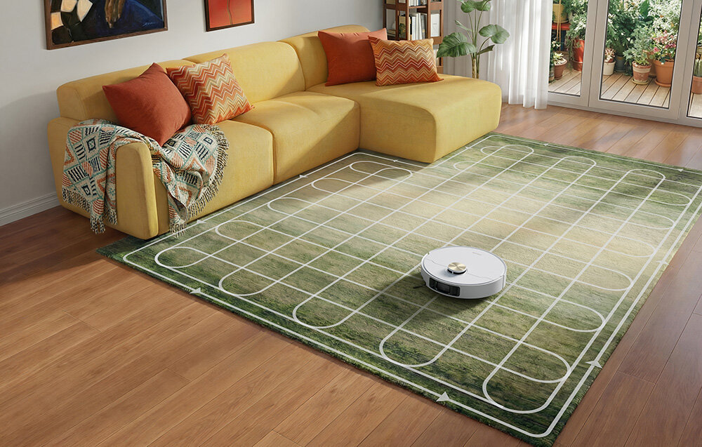 Robot sprzątający DREAME L50 Ultra AE Biały zdjęcie lifestyle Dostosowanie do powierzchni Technologia Smart Carpet Cleaning Strategy na wysokość 10,5 mm