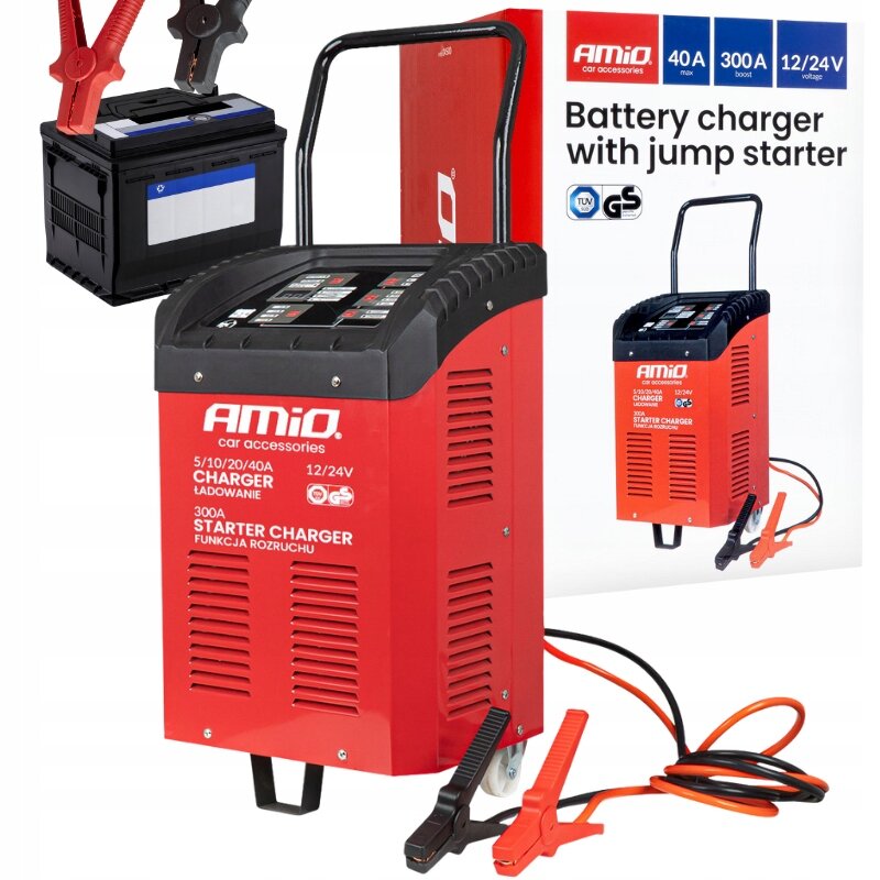 Na obrazie widoczny jest czerwony prostownik z rozruchem marki AMiO, z czarnymi i czerwonymi kablami zakończonymi zaciskami. Obok znajduje się opakowanie z napisem \'Battery charger with jump starter\' oraz specyfikacjami: 40A max, 300A boost, 12/24V voltage.