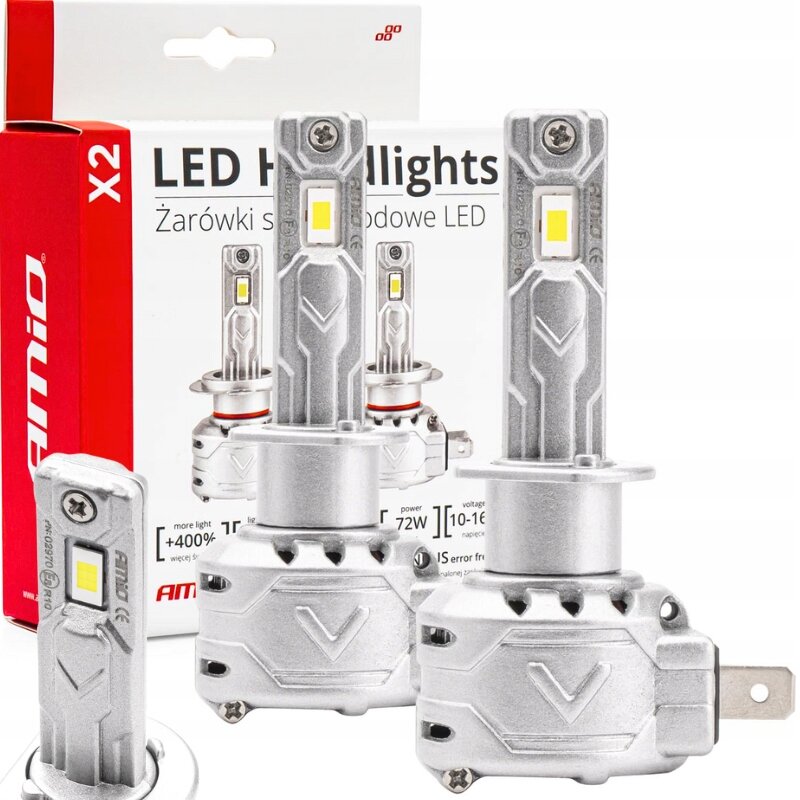 Na obrazie widoczne są dwie srebrne żarówki samochodowe LED z żółtymi elementami świetlnymi, umieszczone przed opakowaniem z napisem \'LED Headlights Żarówki samochodowe LED\'. Na opakowaniu widnieje logo \'amio\'.