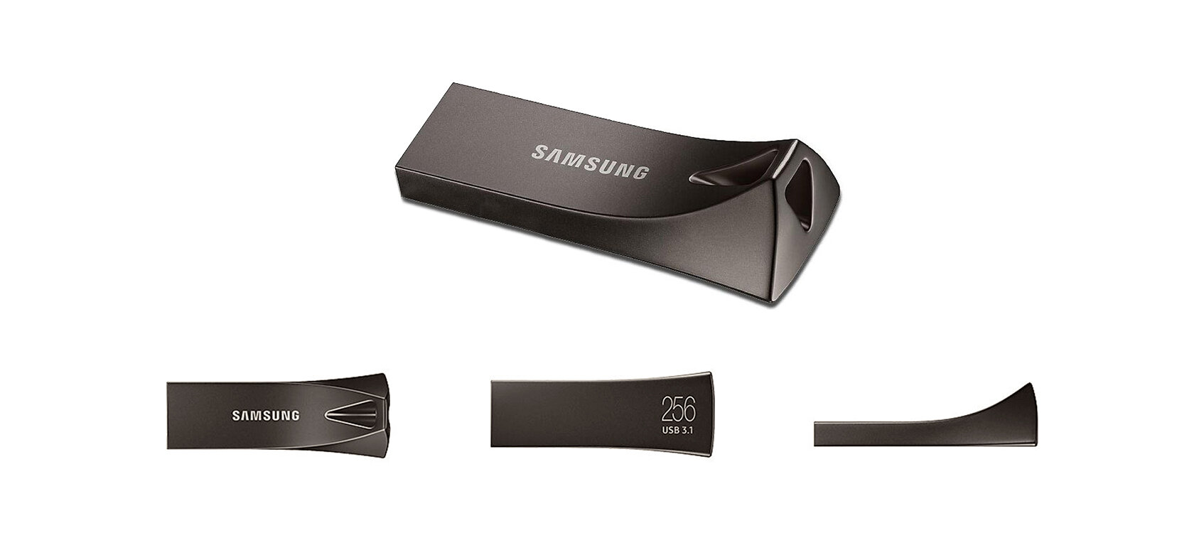 Na obrazie widoczny jest szary pendrive z logo \'SAMSUNG\' na górnej powierzchni. Pendrive ma nowoczesny, metaliczny design z otworem na końcu, a na boku widnieje napis \'256 USB 3.1\'.