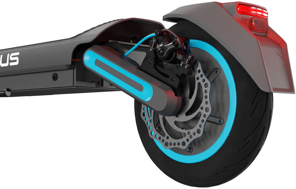 Hulajnoga elektryczna MOTUS Scooty 10 Max 80km 800W Amortyzacja 10 cali białe tło zbliżenie na hamulec na tylnym kole bezpieczeństwo przedni hamulec mechaniczny bębnowy tylny tarczowy bardzo duża siła hamowania niemal bezawaryjne działają na każdej nawierzchni