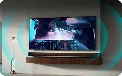 Telewizor na ścianie wyświetlający koncert z graficznym efektem fal dźwiękowych