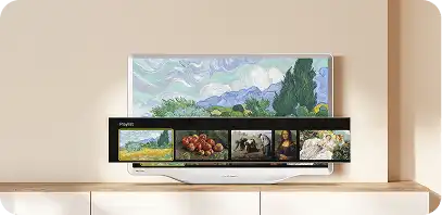 Biały telewizor wyświetla obraz Van Gogha z otwartym menu Playlist zawierającym miniatury dzieł sztuki