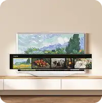 Biały telewizor wyświetla obraz Van Gogha z otwartym menu Playlist zawierającym miniatury dzieł sztuki