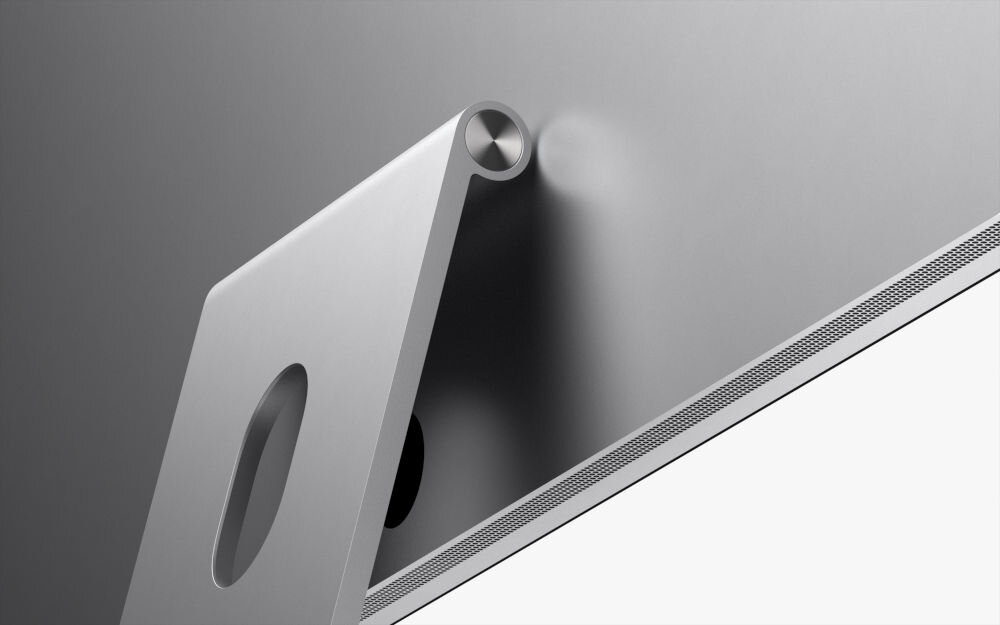 Monitor APPLE Studio Display Zbliżenie na aluminiową obudowę i precyzyjny zawias regulowanej podstawy monitora Apple Studio Display.
