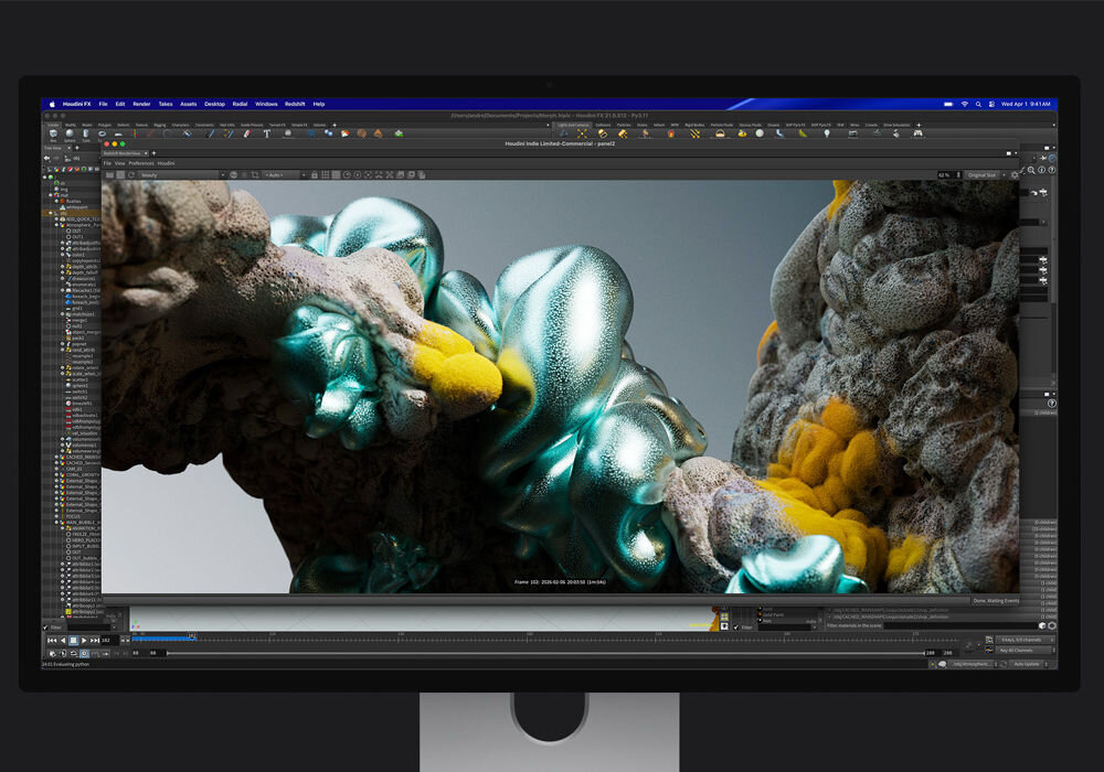 Monitor APPLE Studio Display XDR Ekran monitora z otwartym programem Houdini FX, wyświetlający skomplikowaną, organiczną symulację 3D z teksturami przypominającymi bąbelki, złoto i miedź.