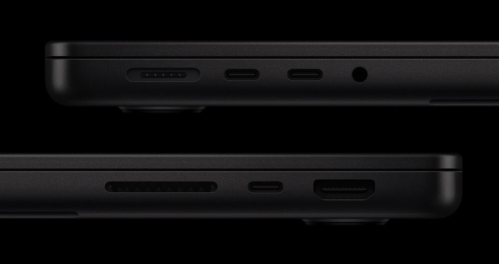 Laptop APPLE MacBook Pro 2026 Zbliżenie na boczne krawędzie czarnego laptopa, pokazujące dostępne porty: MagSafe, dwa porty Thunderbolt (USB-C), gniazdo słuchawkowe, czytnik kart SDXC oraz port HDMI.