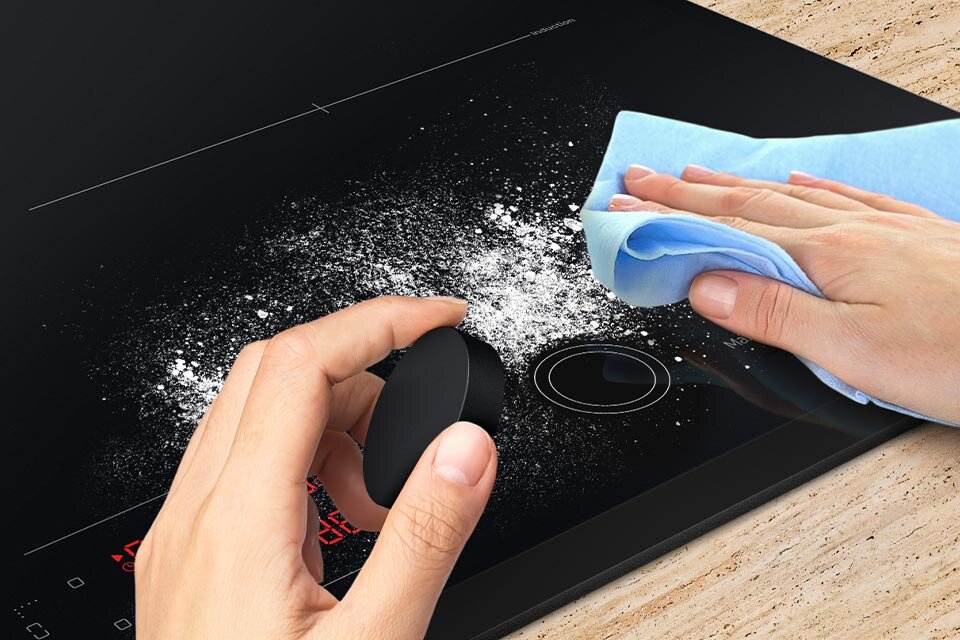 Zdejmowalne pokrętło magnetyczne ułatwia czyszczenie płyty indukcyjnej Samsung NZ64B6058GK