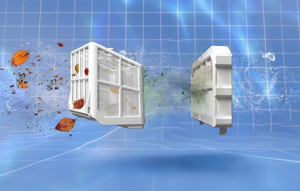 Obraz przedstawia dwa białe elementy przypominające filtry, unoszące się w przestrzeni z niebieską siatką w tle. Wokół nich widać unoszące się liście i drobiny zanieczyszczeń.