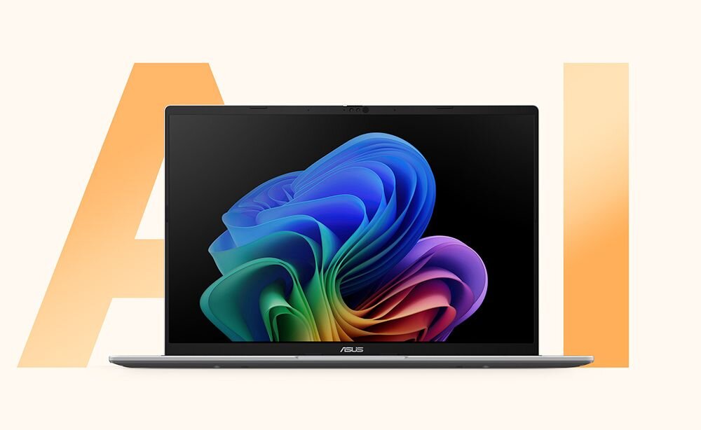 Laptop ASUS VivoBook wyświetla kolorową abstrakcyjną grafikę na ekranie, ustawiony na tle z dużymi literami na jasnej scenie - Dla kogo jest ten laptop?   