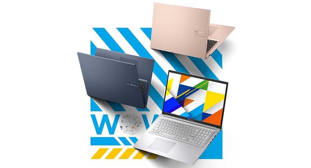 Obraz przedstawia trzy laptopy w różnych kolorach: różowym, granatowym i srebrnym. Na ekranie srebrnego laptopa widoczny jest kolorowy wzór geometryczny.