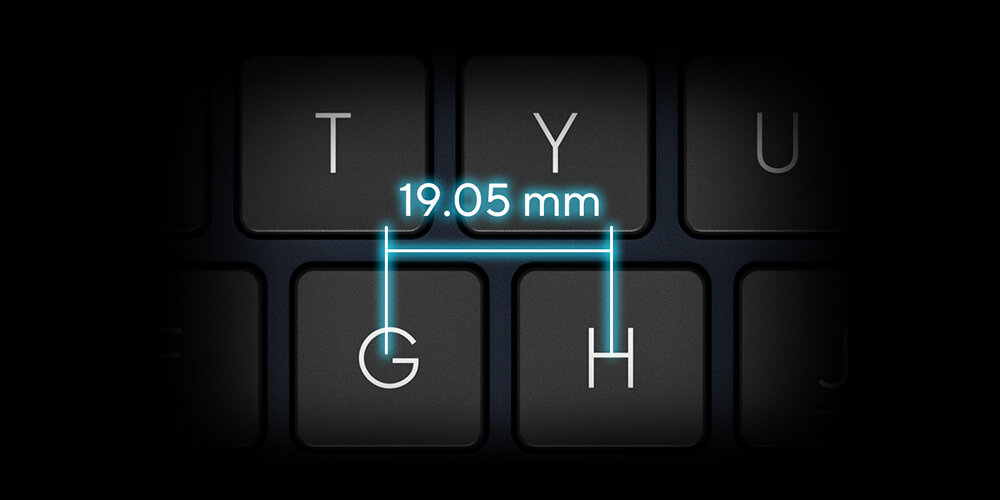 Obraz przedstawia klawiaturę z klawiszami T, Y, G, H, U. Nad klawiszami G i H widoczny jest napis \'19.05 mm\'.