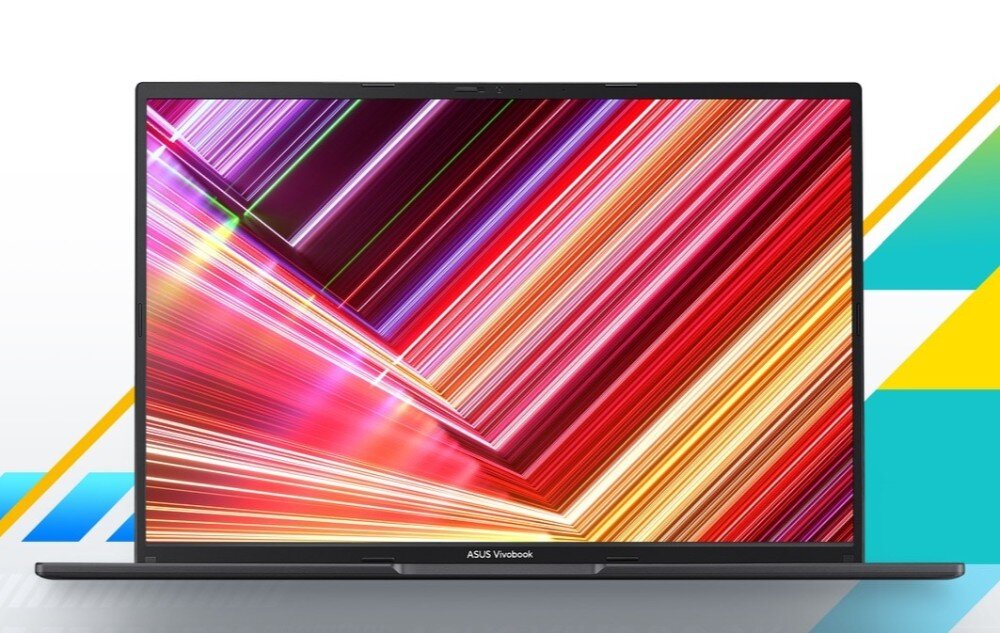 Laptop z wyświetlaczem pokazującym kolorowe, abstrakcyjne linie w różnych odcieniach czerwieni, różu i żółci. Na dolnej ramce ekranu widoczny jest napis \'ASUS Vivobook\'.