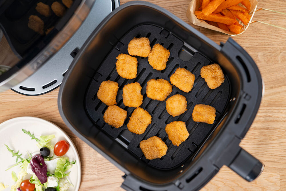Air Fryer Frytkownica beztłuszczowa ZELMER ZAF8650 kosz w koszu nuggetsy Dual heating technology optymalne rezultaty kulinarne dwie grzałki równomiernie rozprowadzone ciepło upieczone potrawy chrupiące z każdej strony mniej wysiłku większa wygoda szybsze pieczenie złocista skórka soczyste wnętrze pełnia smaku praktyczne rozwiązanie optymalny rezultat   