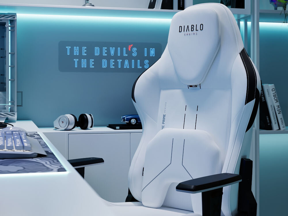 Fotel DIABLO CHAIRS X-One 2.0 Prime Biało-czarny prezentacja fotela przysuniętego do biurka na tle pokoju ergonomia estetyka dynamiczna konstrukcja detale