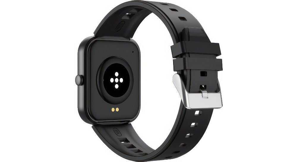 Czarny smartwatch z prostokątną kopertą i silikonowym paskiem z metalową klamrą. Na spodzie koperty widoczne są sensory i dwa złote styki.