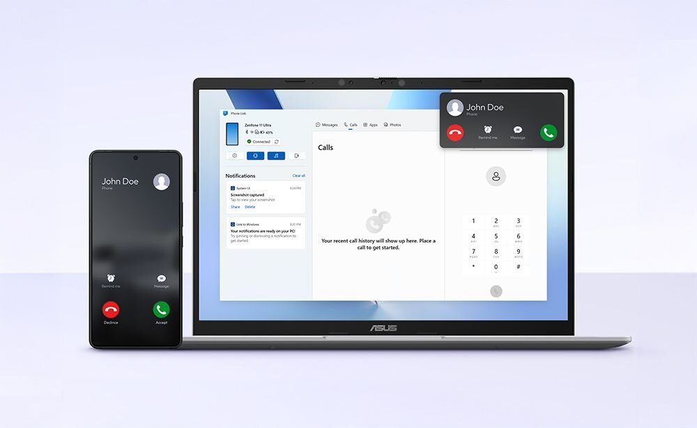 Na obrazie widoczny jest laptop z logo ASUS na dolnej ramce ekranu, obok którego znajduje się smartfon. Na ekranie laptopa i smartfona wyświetlone są powiadomienia o połączeniu od osoby o nazwie John Doe.