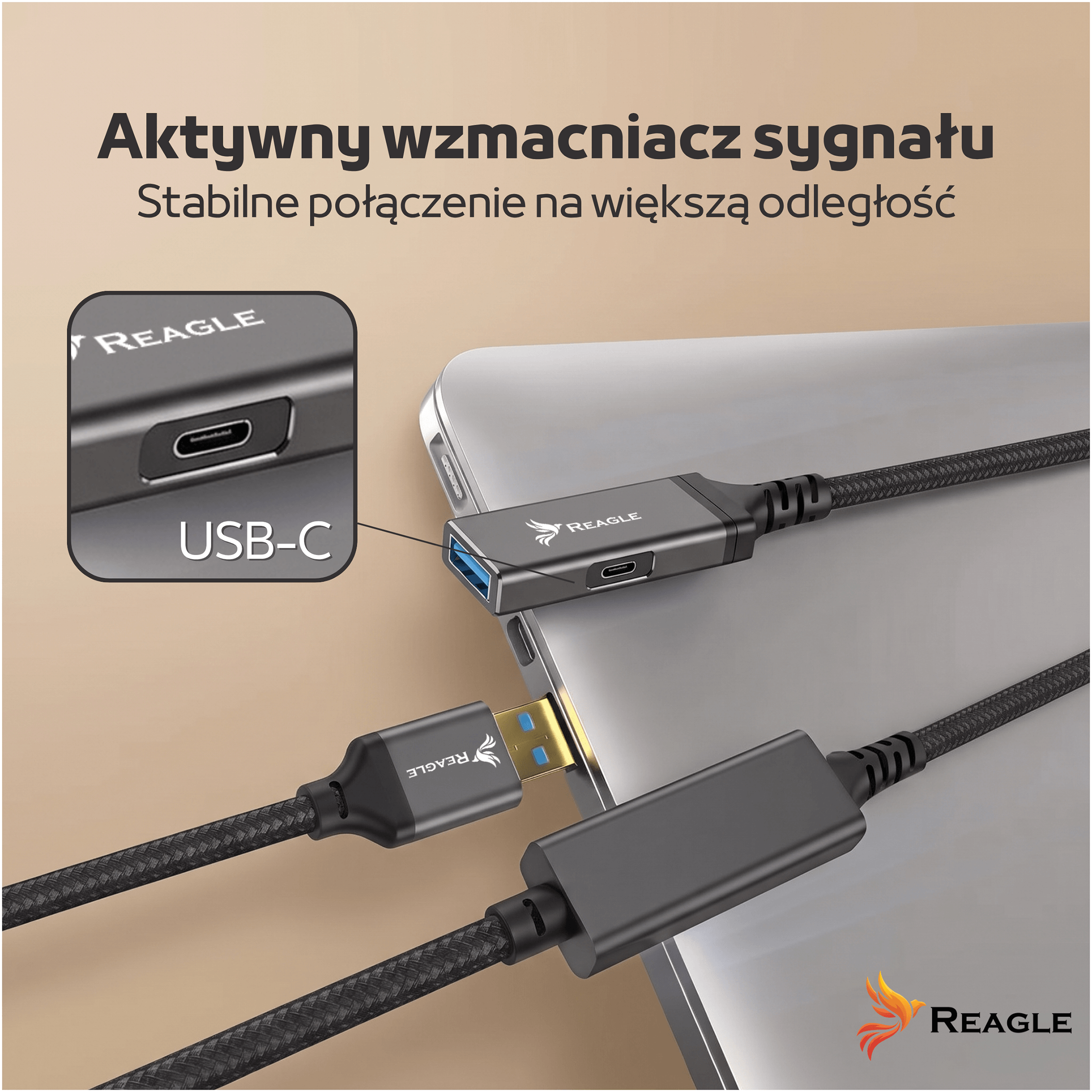 Obraz przedstawia aktywny kabel USB z logo Reagle, podłączony do laptopa. Widoczny jest napis: \'Aktywny wzmacniacz sygnału Stabilne połączenie na większą odległość\'.