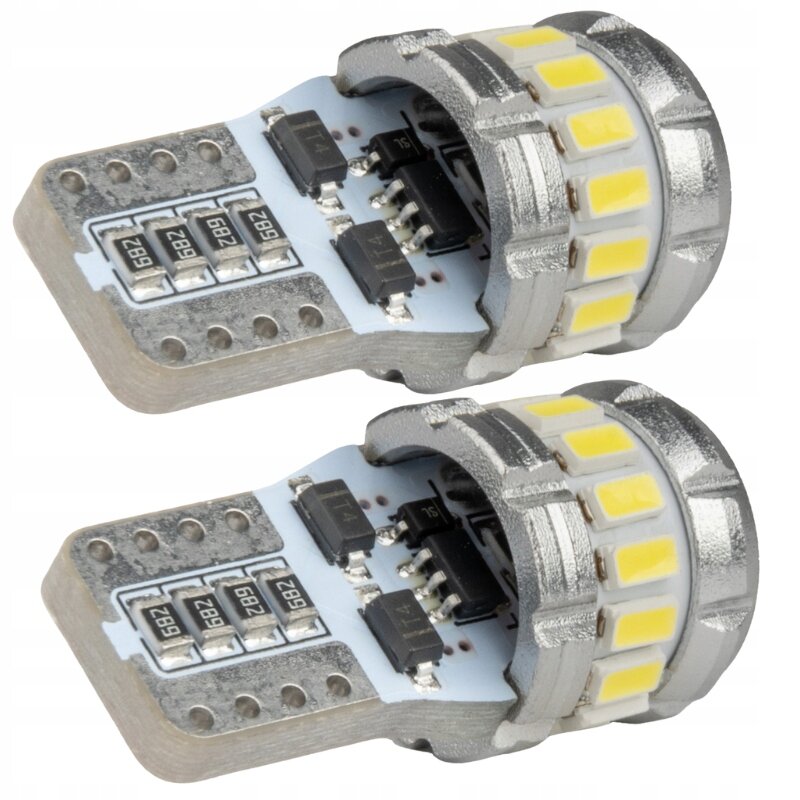 Dwie żarówki LED z widocznymi diodami i elementami elektronicznymi na płytce. Żarówki mają metaliczne wykończenie i żółte diody LED rozmieszczone wokół obudowy.