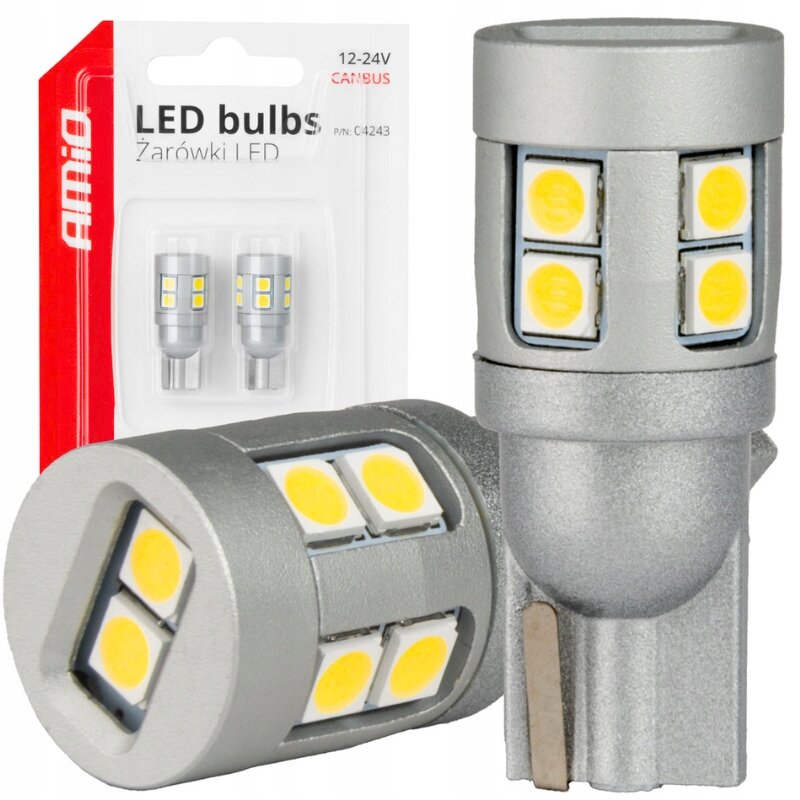 Na obrazie widoczne są dwie żarówki LED z żółtymi diodami, a w tle opakowanie z napisem \'AMiO LED bulbs Żarówki LED 12-24V CANBUS\'.