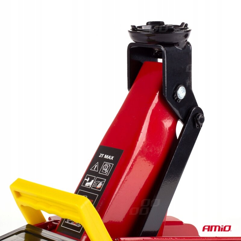 Na obrazie widoczny jest czerwony podnośnik hydrauliczny z czarnymi elementami i żółtym uchwytem. Na podnośniku znajduje się napis \'2T MAX\' oraz logo \'AMiO\'.