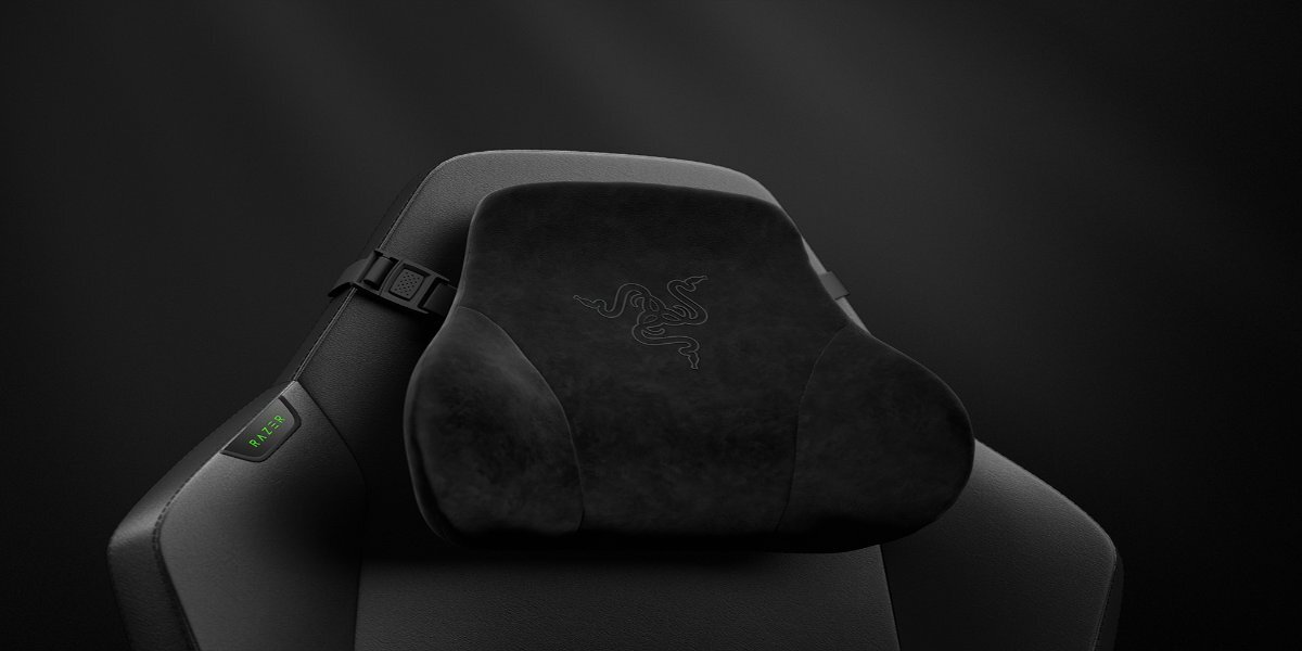 Przybliżenie na zagłówek fotela gamingowego Razer Iskur V2 Newgen Black, tło jest ciemne.