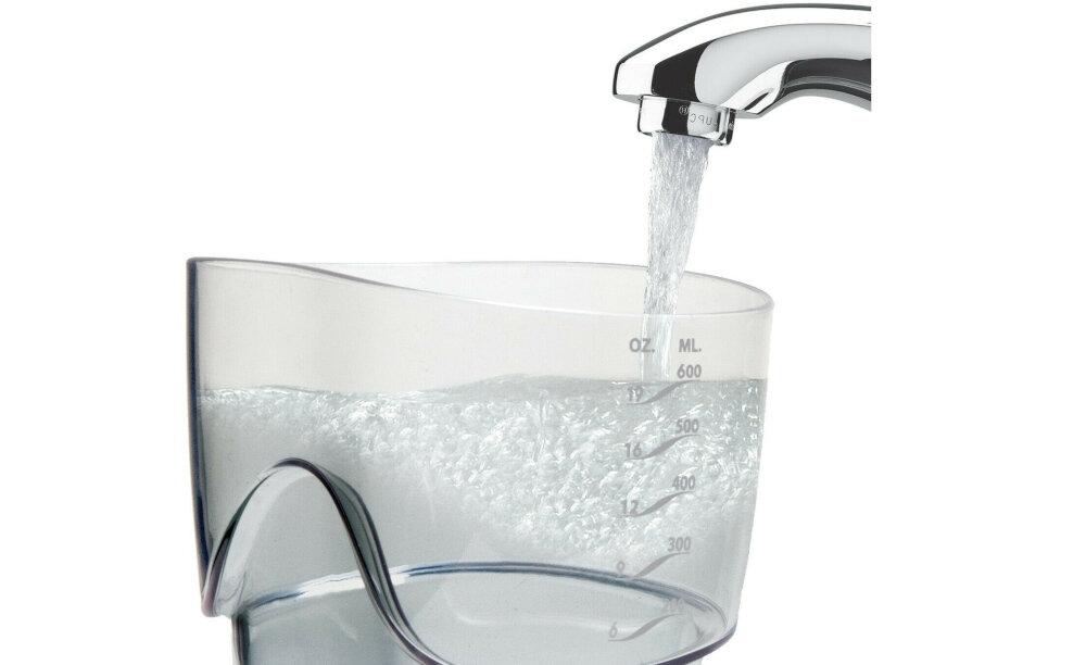 Irygator WATERPIK WF-06 EU przechowywanie koncowek duzy zbiornik 600ml okolo 90 sekund irygowania czas pracy