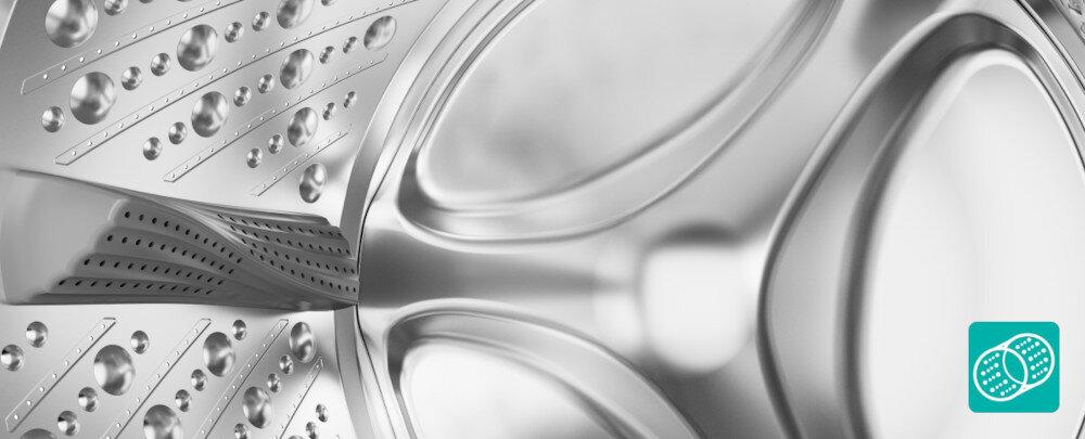 PRALKA GORENJE W3NGPI61SAS Zdjęcie przedstawia wnętrze bębna pralki z wyraźnie widoczną strukturą powierzchni, która ma zapewnić delikatne obchodzenie się z tkaninami podczas prania. W prawym dolnym rogu umieszczono ikonkę odnoszącą się do systemu ochrony materiałów delikatne pranie ochrona tkanin zmiękczanie włókien ograniczenie zagnieceń łatwiejsze prasowanie