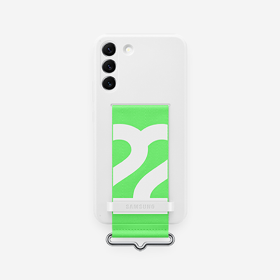 Na obrazie widoczny jest biały smartfon z trzema aparatami i zielonym paskiem z białym wzorem. Na pasku znajduje się napis \'SAMSUNG\'.