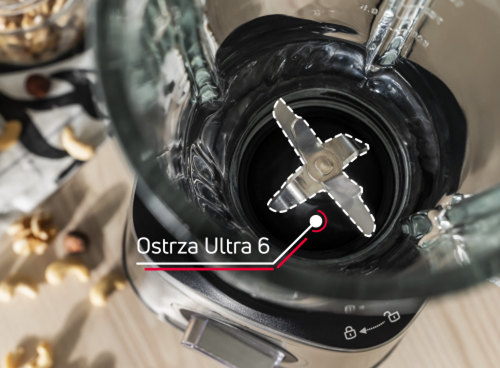 Zdjęcie przedstawia wnętrze kielicha blendera z widocznymi ostrzami. Na obrazie znajduje się tekst: \'Ostrza Ultra 6\'.