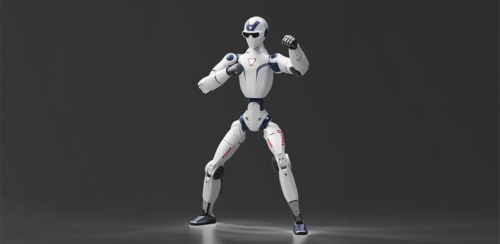 Na obrazie znajduje się humanoidalny robot w białym kolorze z niebieskimi akcentami, ustawiony w dynamicznej pozycji na ciemnym tle.