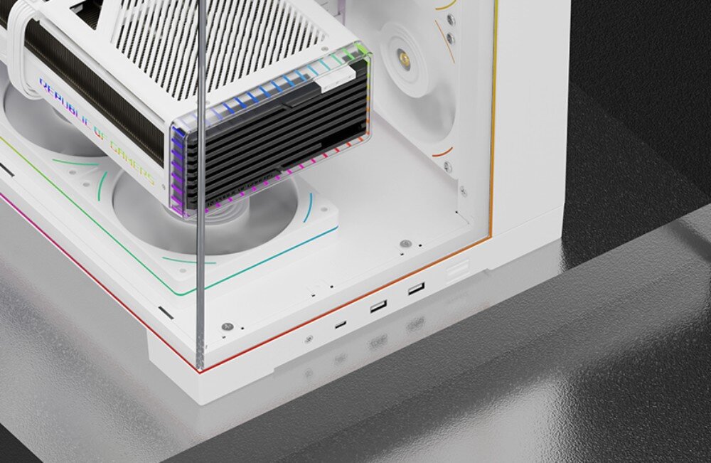 Obudowa THERMALRIGHT A70 ARGB Zbliżenie na dolny przedni róg złożonej obudowy pokazujące zewnętrzny panel z gniazdem audio i portami USB, przez szybę widać fragment karty graficznej z napisem 'REPUBLIC OF GAMERS' oraz podświetlane na pomarańczowo wentylatory